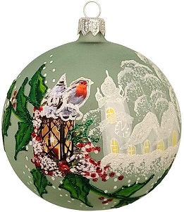 Grøn julekugle med en fugl på lanterne